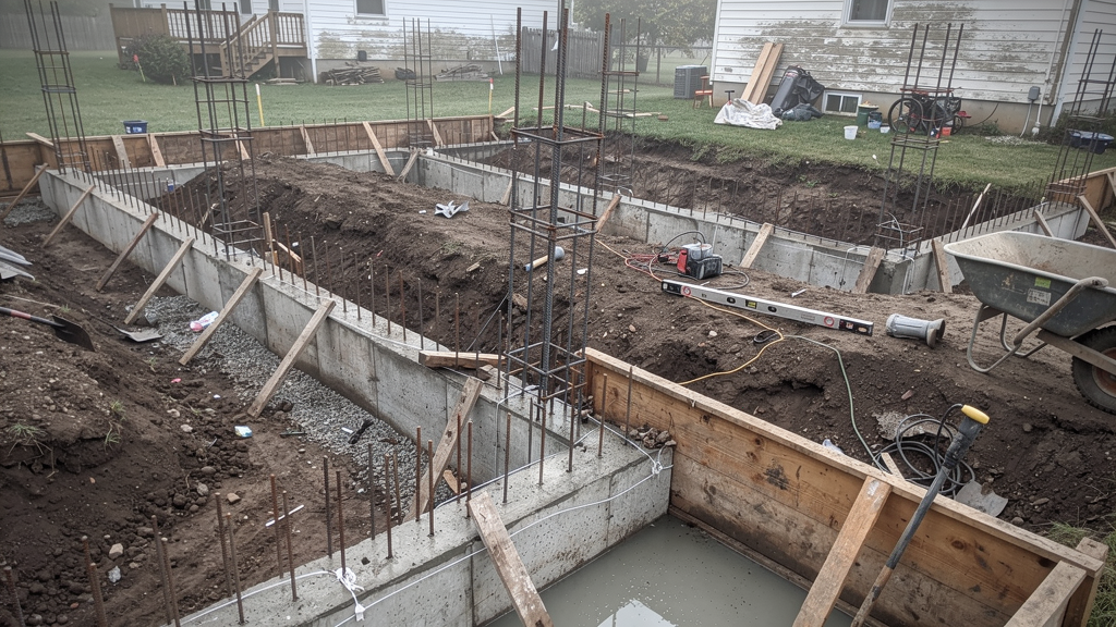 Foundation forms and reinforcing steel prepared at a residential build site