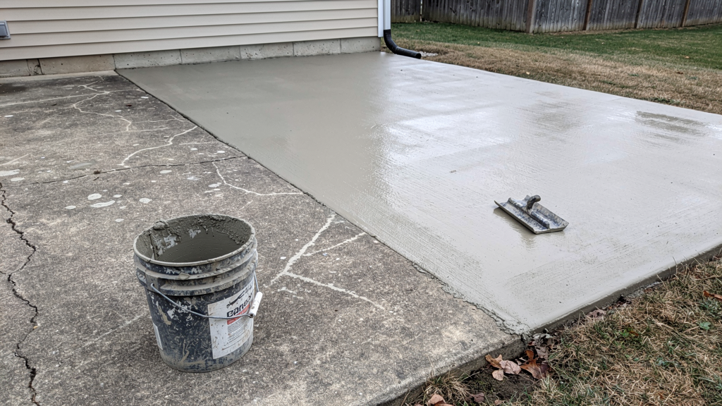 Concrete resurfacing tools and a refreshed slab surface