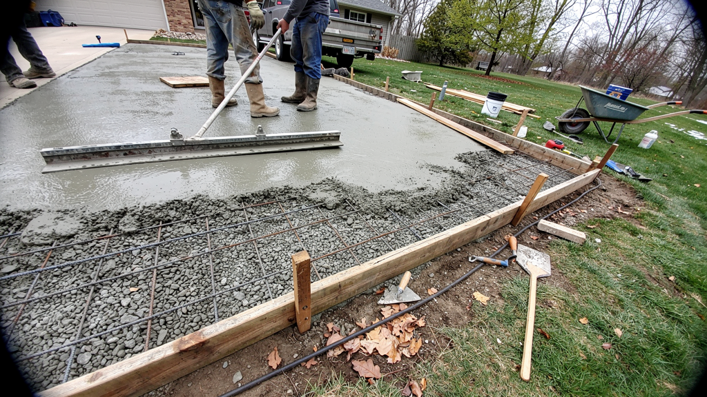 Forms and reinforcement prepared for a new concrete driveway